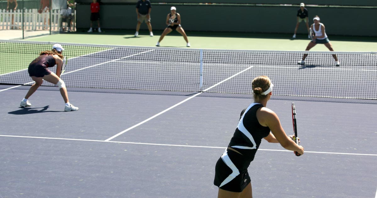Double match about to begin with a serve